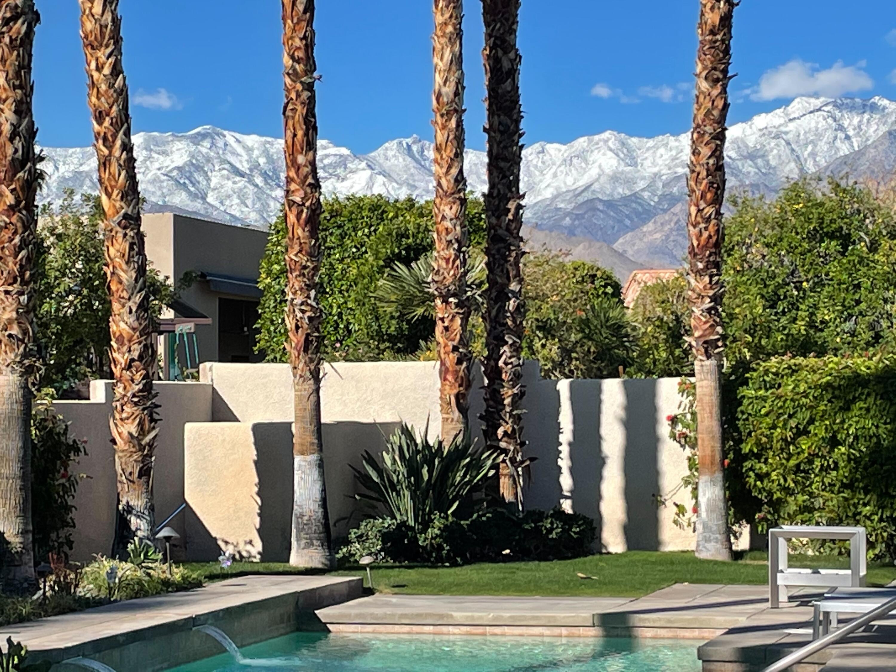 70955 Sunny Lane Rancho Mirage, CA 92270 - Photo 32 of 35 a view of a house with street sign and a tree