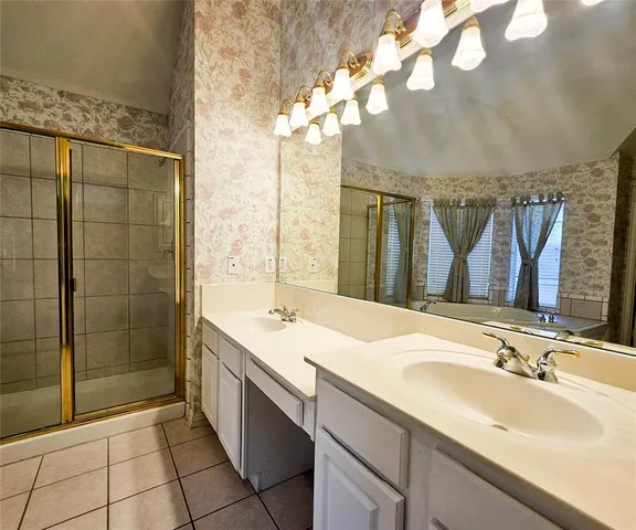 a bathroom with a bathtub and a sink