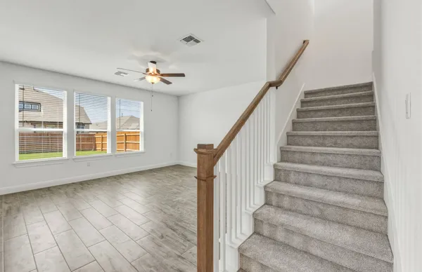 a picture of a bathroom with sink and mirror