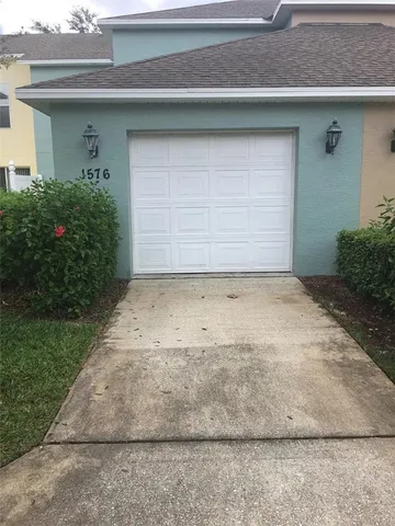 a view of a backyard of the house