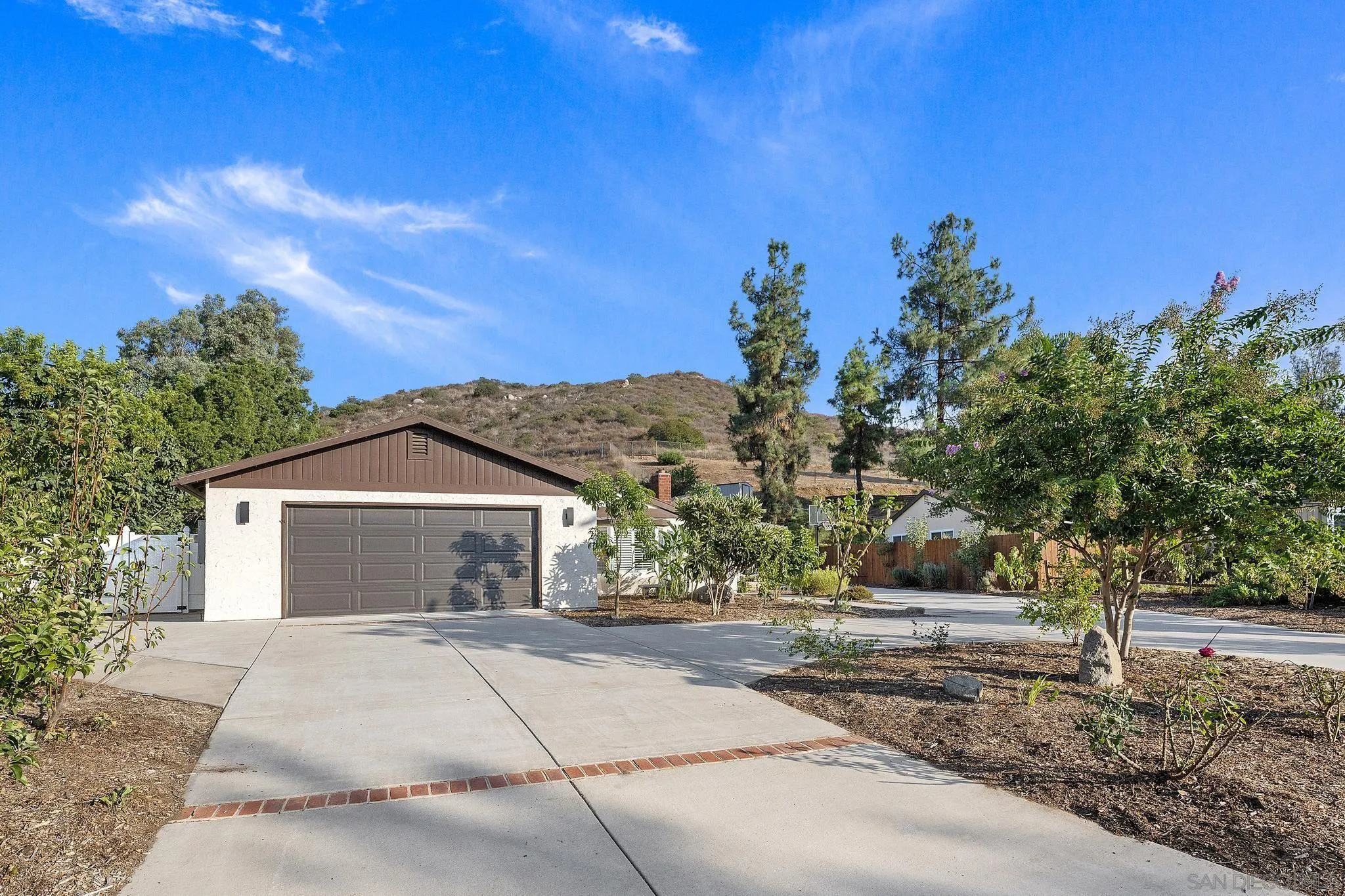 14433 Range Park Road Poway, CA 92064 - Photo 11 of 46 front view of a house with a yard
