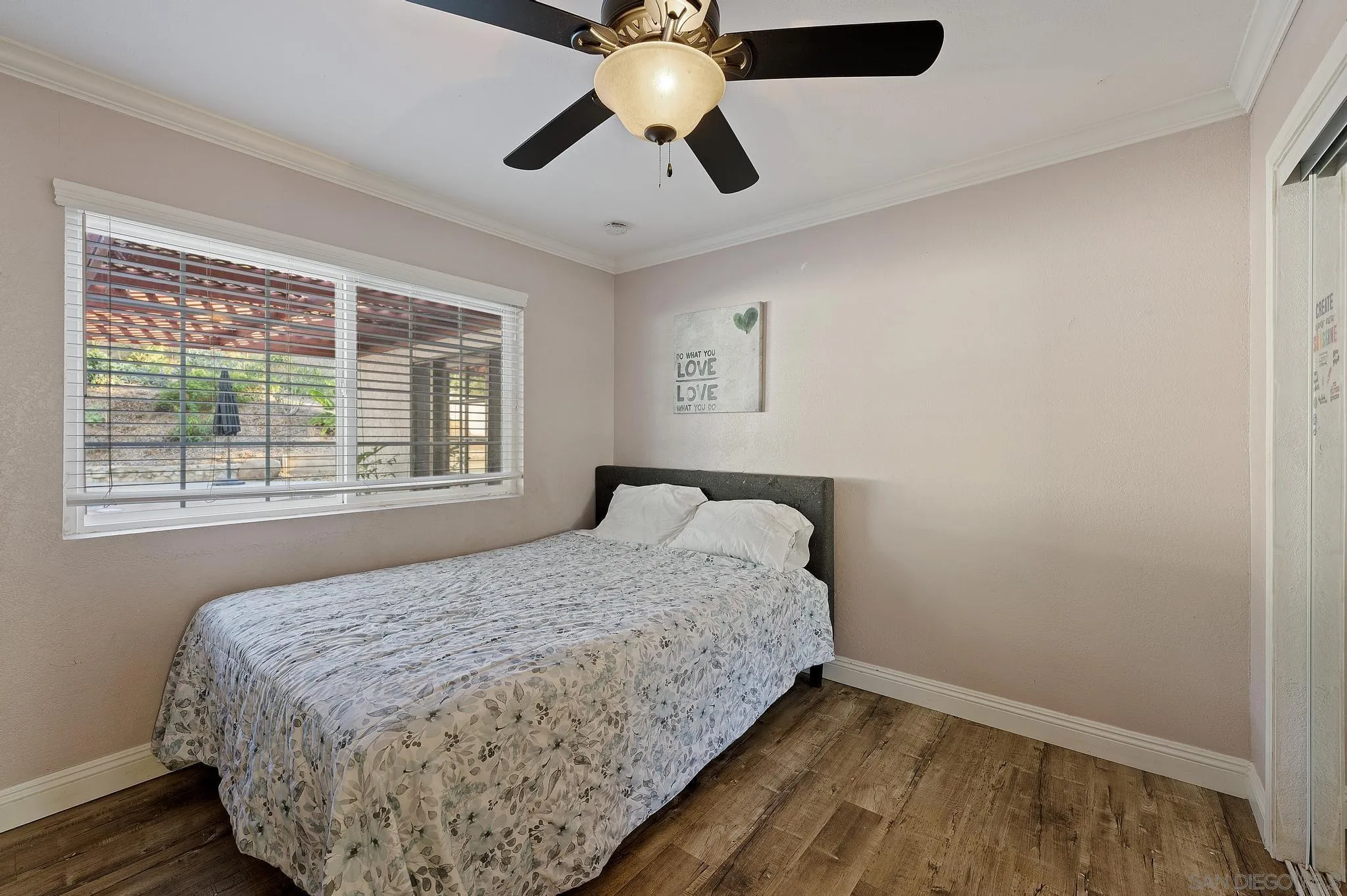 14433 Range Park Road Poway, CA 92064 - Photo 32 of 46 a bedroom with a bed and a window