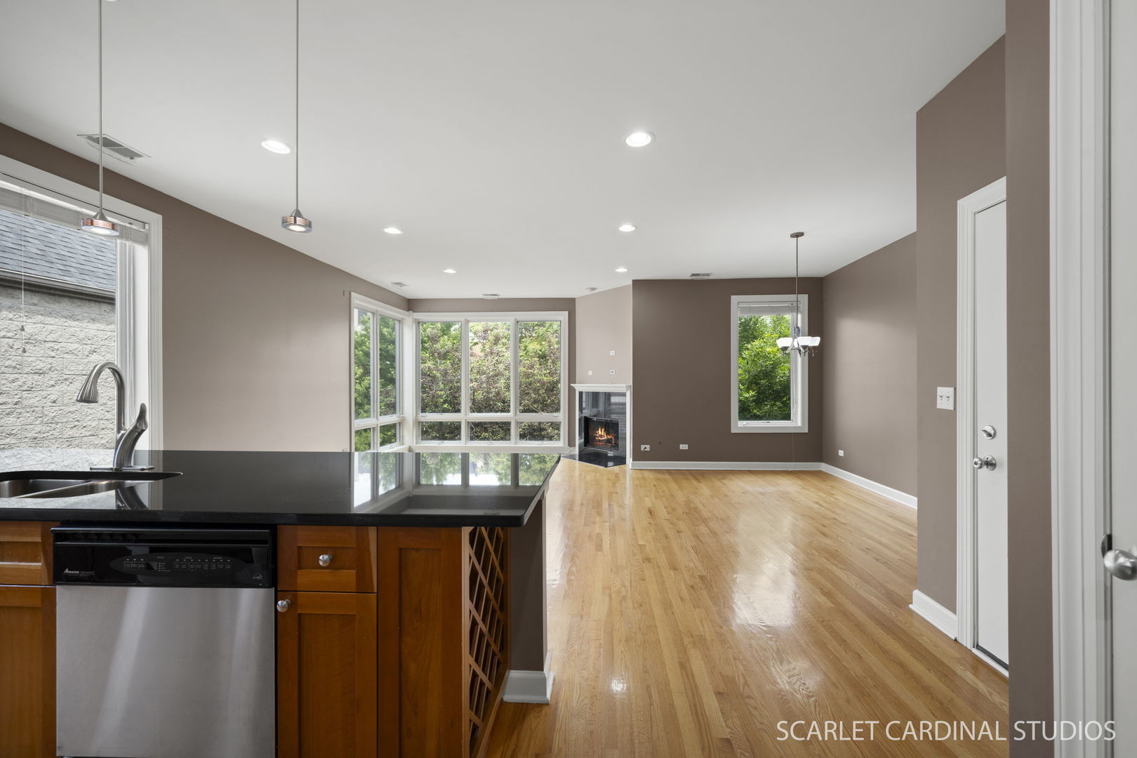 1419 West Fillmore Street, Unit 3W Chicago, IL 60607 - Photo 15 of 26 a view of a kitchen with granite countertop a refrigerator and a sink