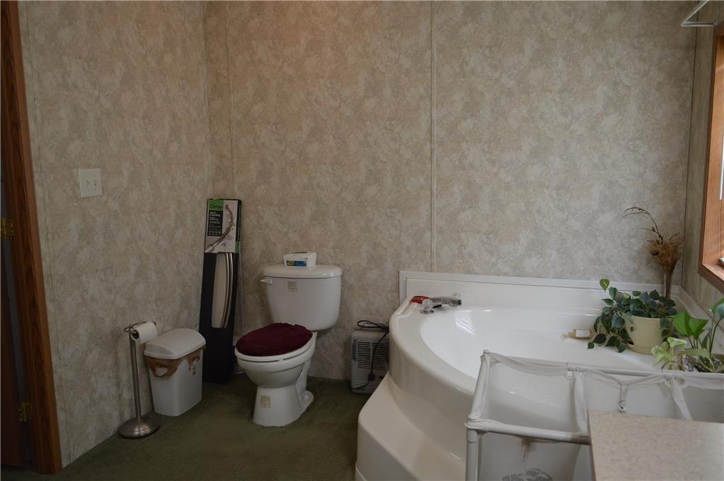 1566 Kingman Road Kingman, ME 04451 - Photo 12 of 20 Soaking tub in master bedroom