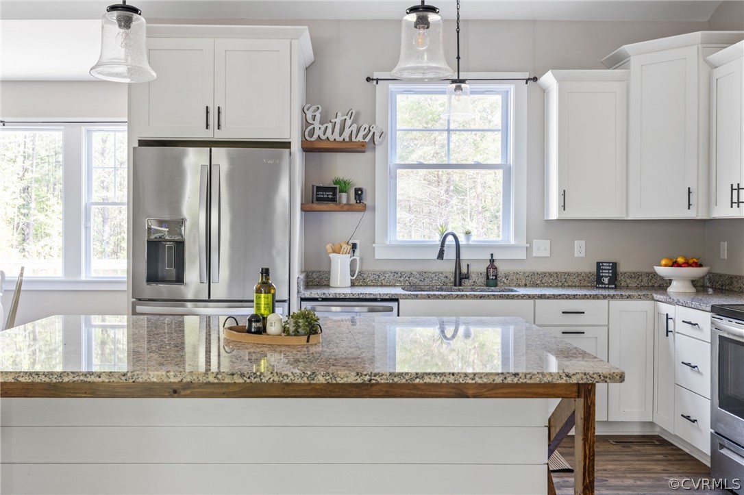 3925 Old Ridge Road Farmville, VA 23901 - Photo 15 of 50 a kitchen with stainless steel appliances granite countertop a sink window and cabinets