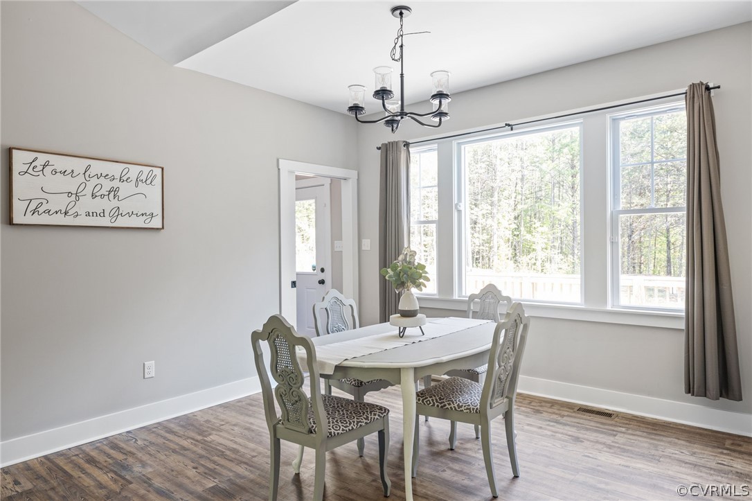 3925 Old Ridge Road Farmville, VA 23901 - Photo 21 of 50 a view of a dining room with furniture window and wooden floor