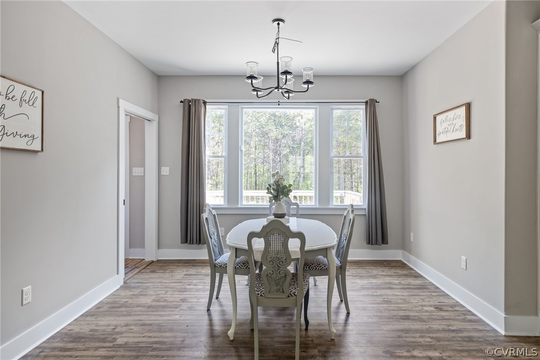 3925 Old Ridge Road Farmville, VA 23901 - Photo 22 of 50 a view of a dining room with furniture window and wooden floor