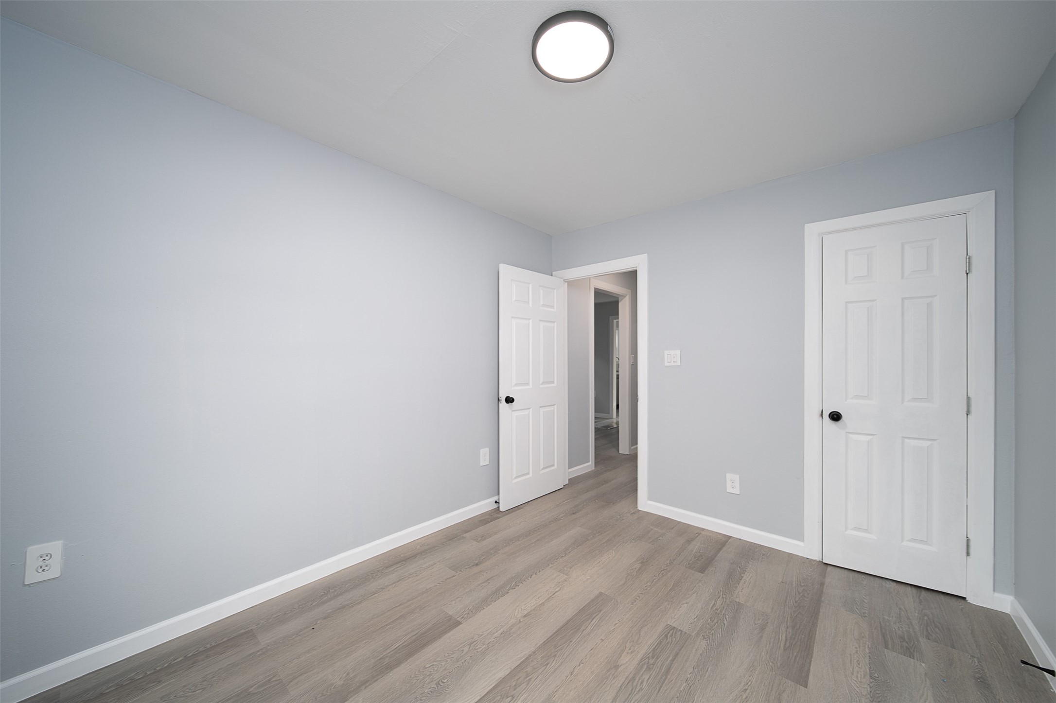 3120 Stonewall Street Houston, TX 77020 - Photo 3 of 18 a view of an empty room and wooden floor