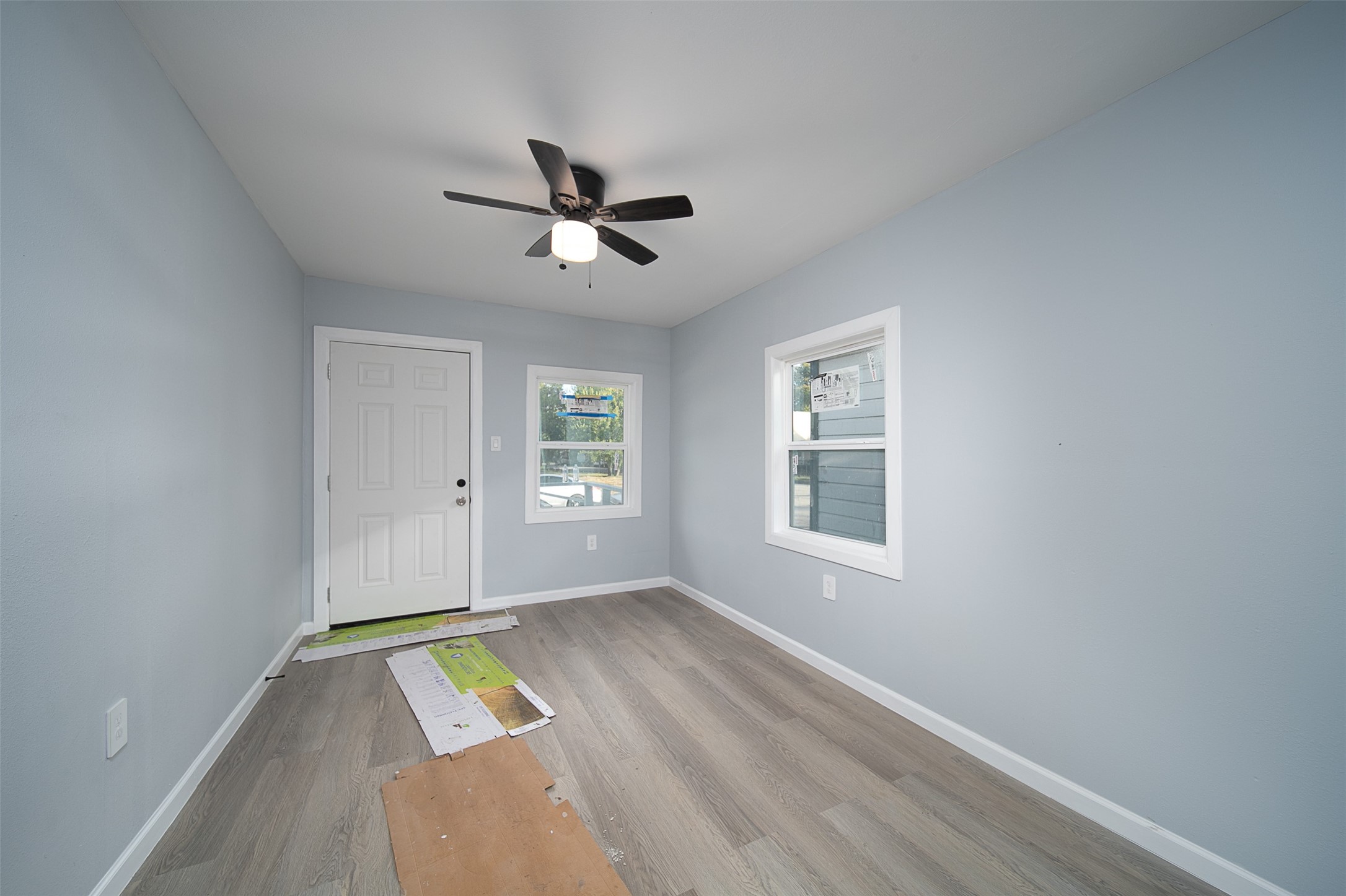 3120 Stonewall Street Houston, TX 77020 - Photo 10 of 18 a view of room with hardwood floor and window