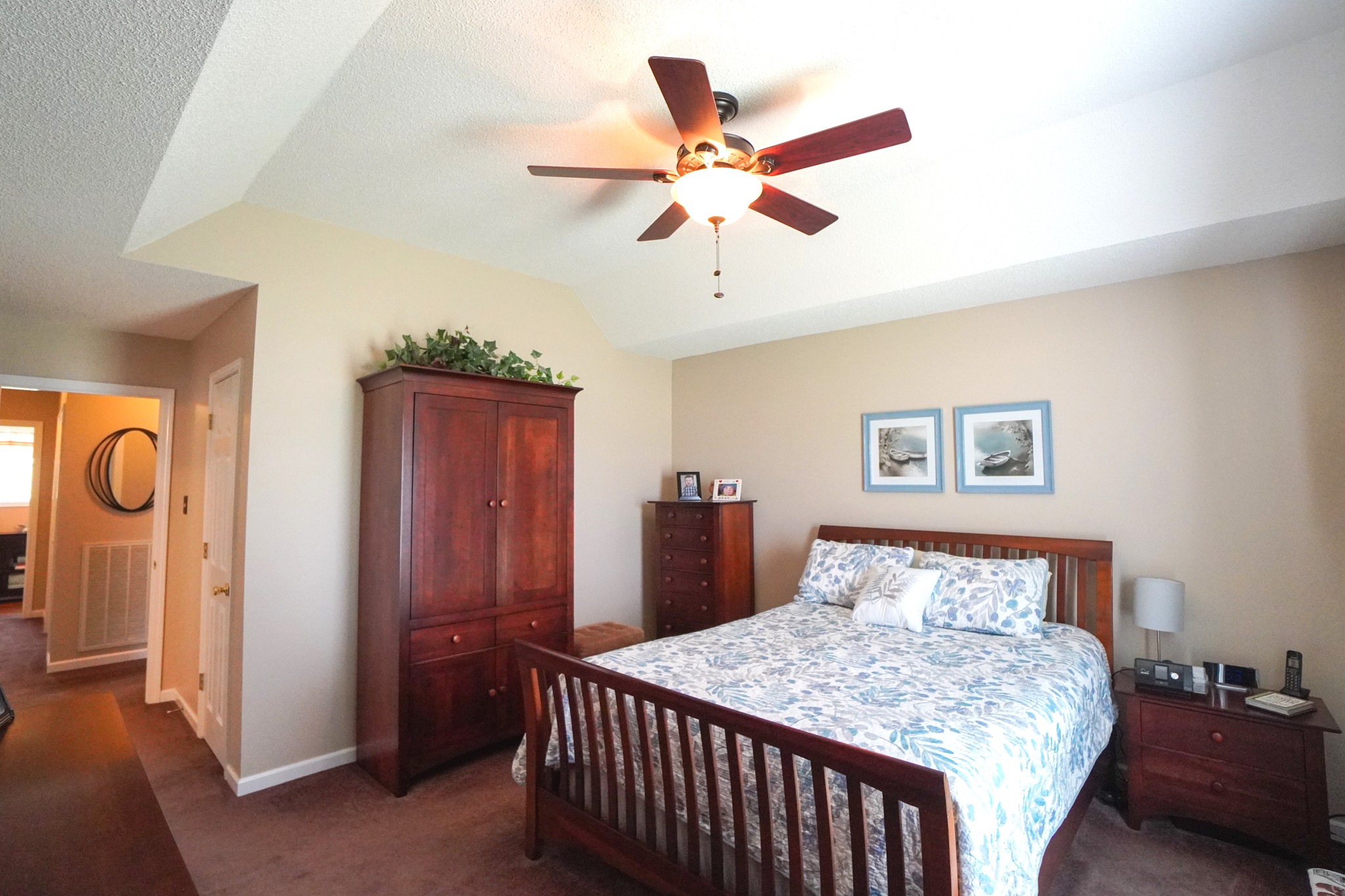 1890 Clara Mathis Road Spring Hill, TN 37174 - Photo 12 of 45 a bedroom with a bed and a chandelier