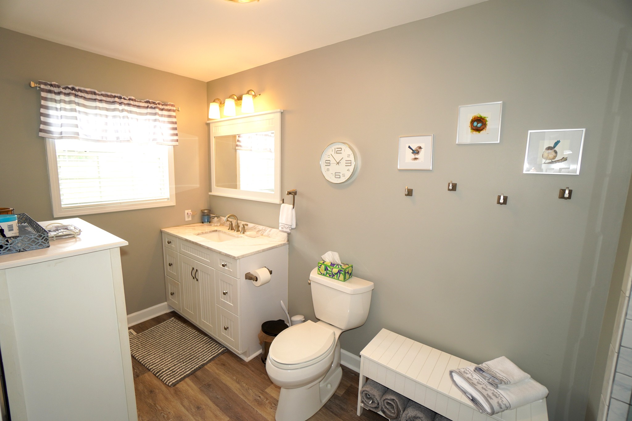 1890 Clara Mathis Road Spring Hill, TN 37174 - Photo 15 of 45 a bathroom with a granite countertop toilet sink and a window