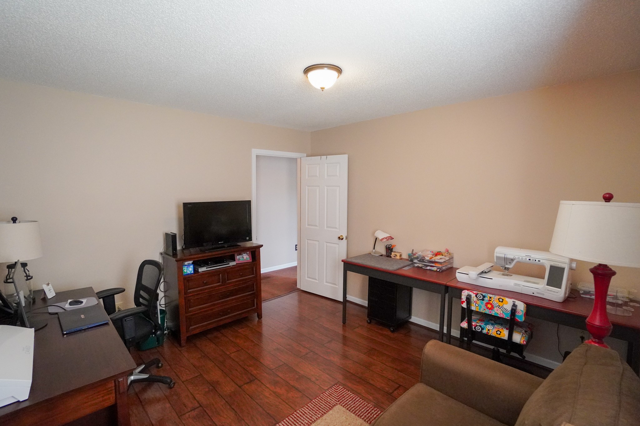 1890 Clara Mathis Road Spring Hill, TN 37174 - Photo 17 of 45 a living room with furniture and a flat screen tv