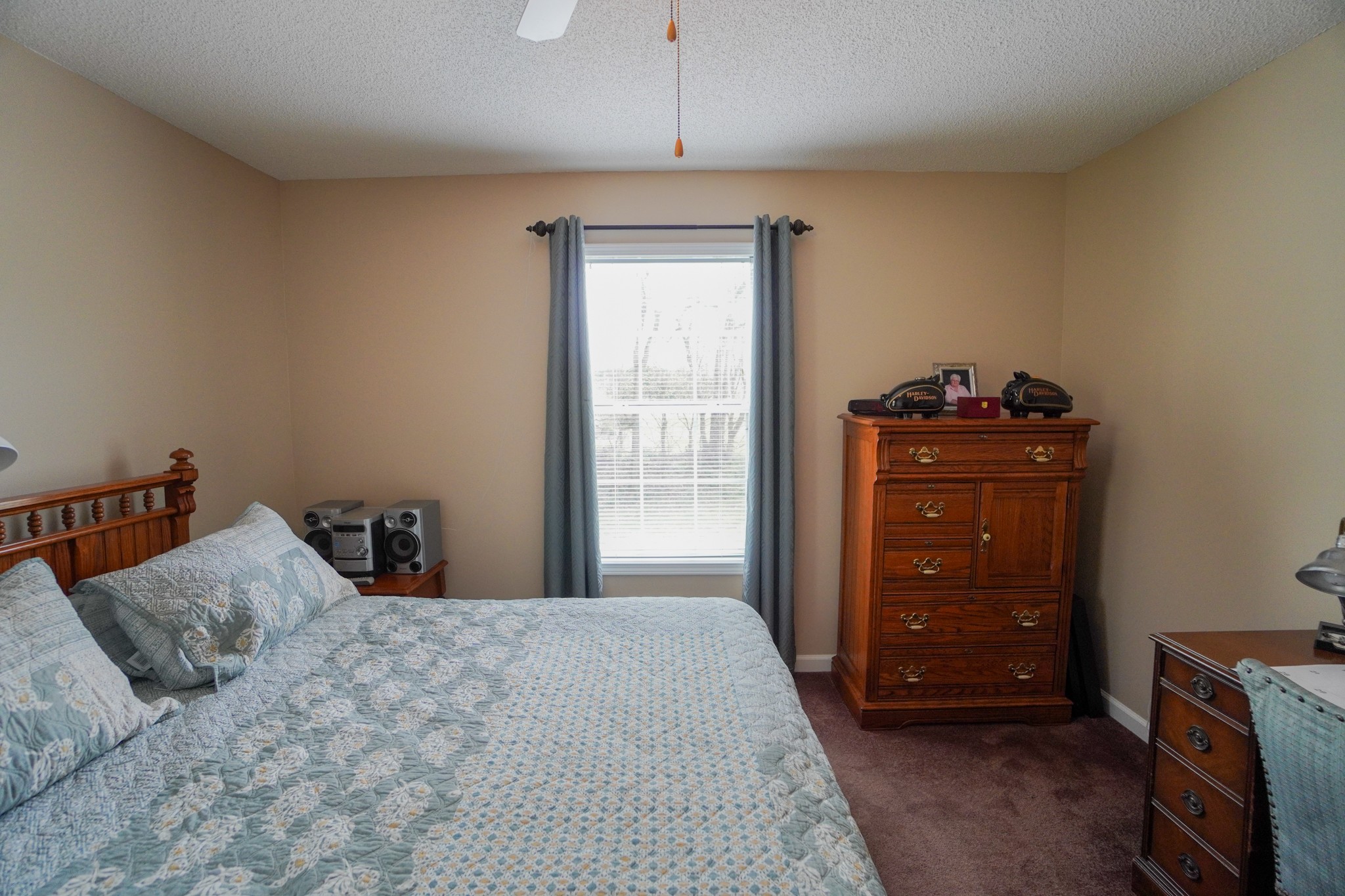 1890 Clara Mathis Road Spring Hill, TN 37174 - Photo 23 of 45 a bedroom with a bed and a dresser