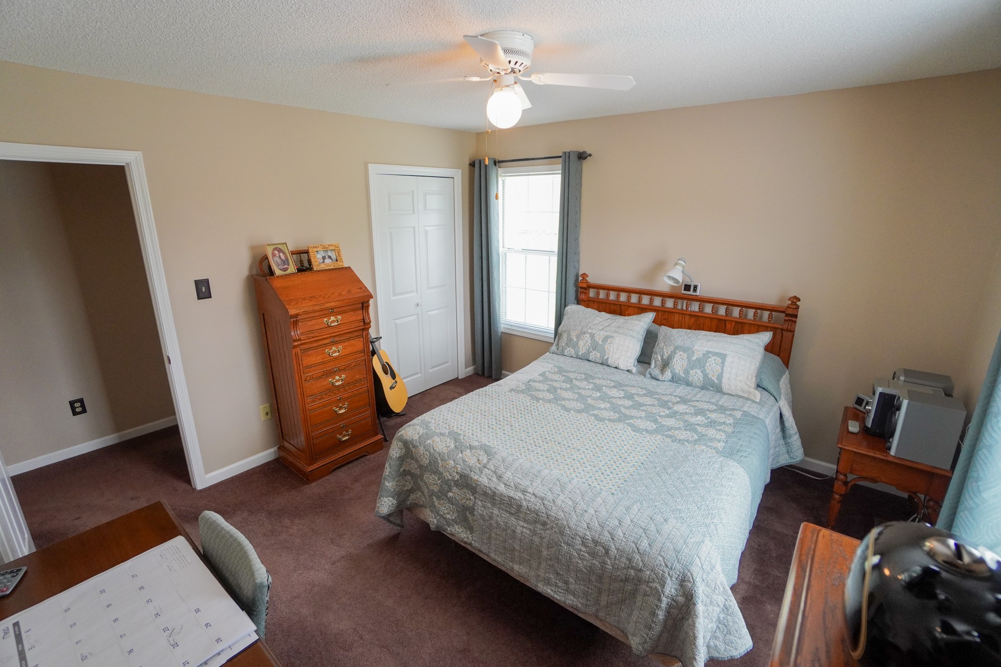1890 Clara Mathis Road Spring Hill, TN 37174 - Photo 24 of 45 a bedroom with a bed and wooden floor