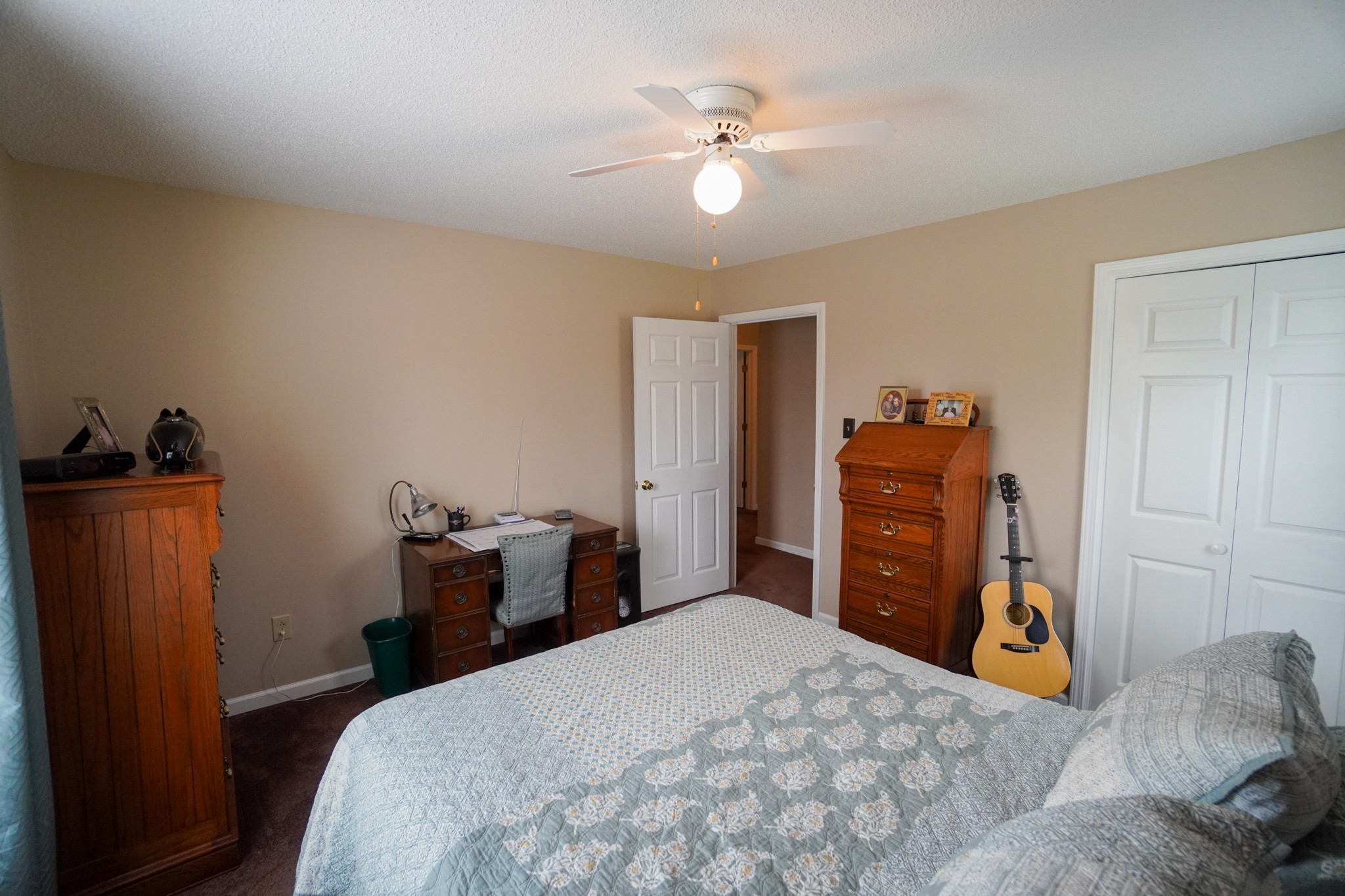 1890 Clara Mathis Road Spring Hill, TN 37174 - Photo 25 of 45 a bedroom with a bed and dresser