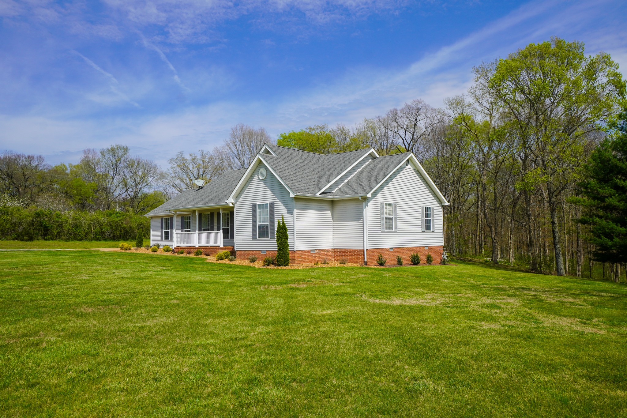 1890 Clara Mathis Road Spring Hill, TN 37174 - Photo 33 of 45 a view of a house with a big yard