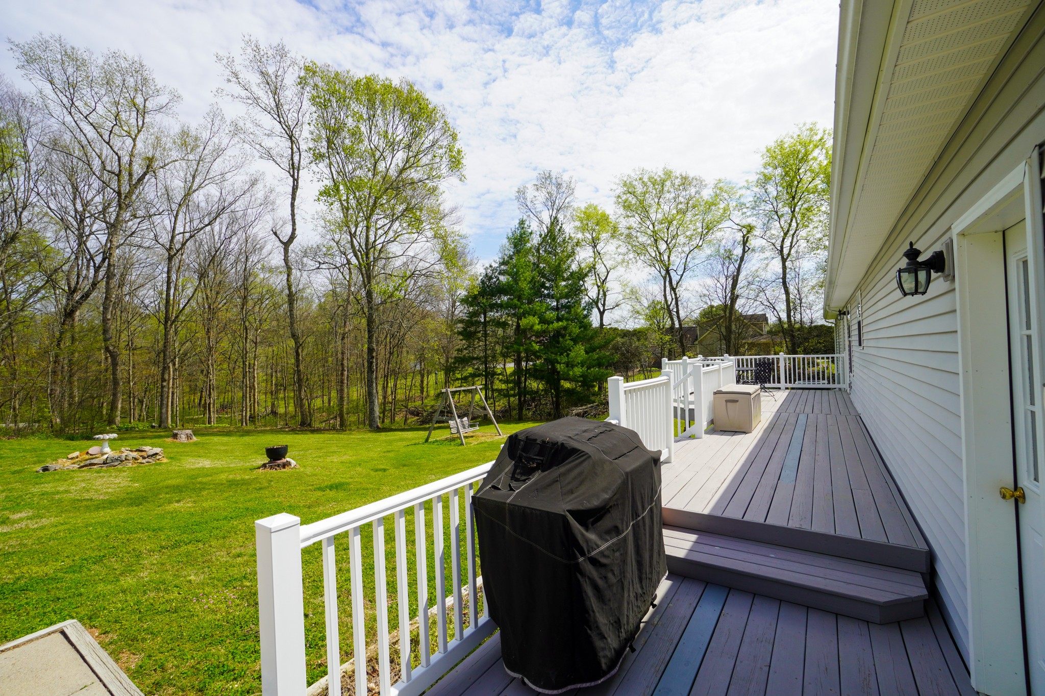 1890 Clara Mathis Road Spring Hill, TN 37174 - Photo 37 of 45 a view of a deck with couches and wooden floor