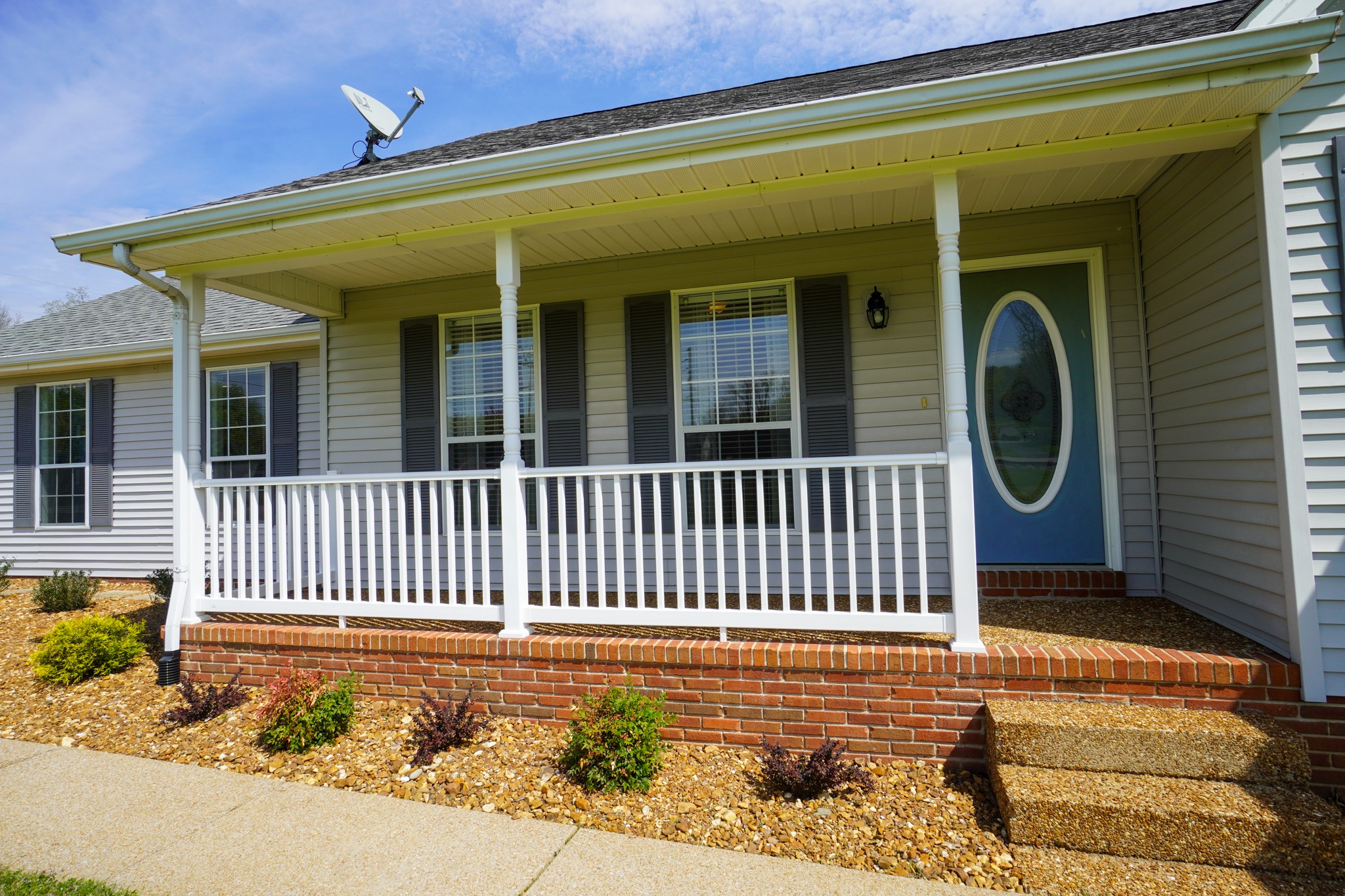 1890 Clara Mathis Road Spring Hill, TN 37174 - Photo 4 of 45 a front view of a house with a garden