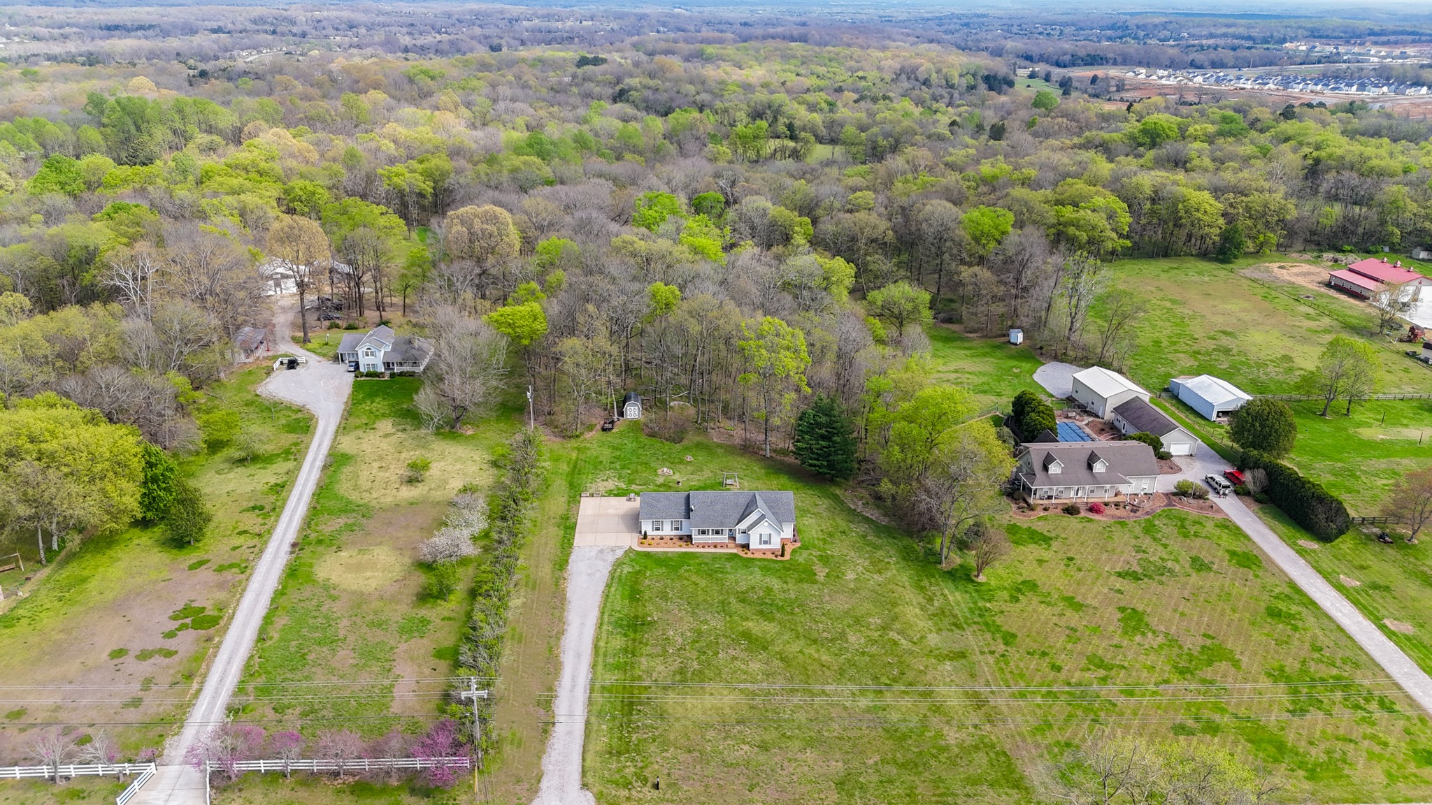 1890 Clara Mathis Road Spring Hill, TN 37174 - Photo 45 of 45 an aerial view of residential houses with outdoor space