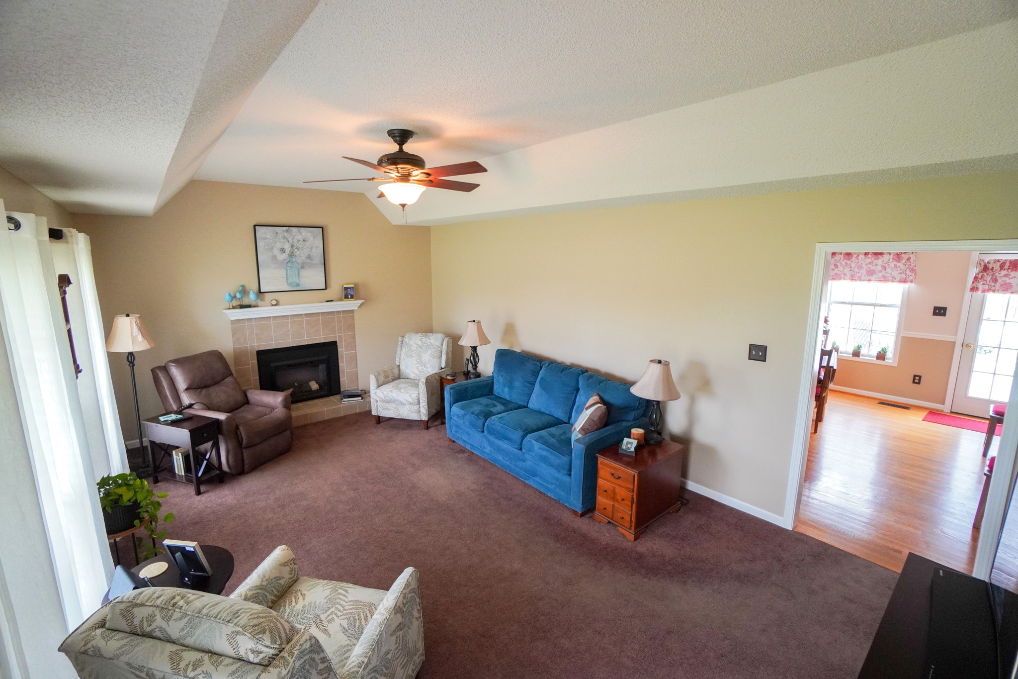 1890 Clara Mathis Road Spring Hill, TN 37174 - Photo 6 of 45 a living room with furniture and a fireplace