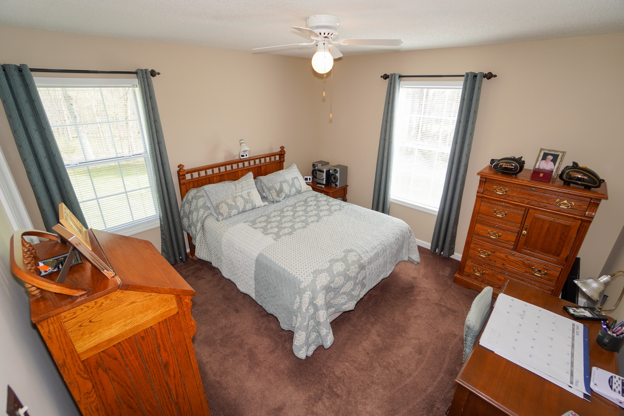 1890 Clara Mathis Road Spring Hill, TN 37174 - Photo 9 of 45 a bedroom with a bed dresser and a window