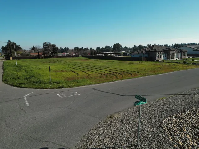 a view of a golf course with a lake