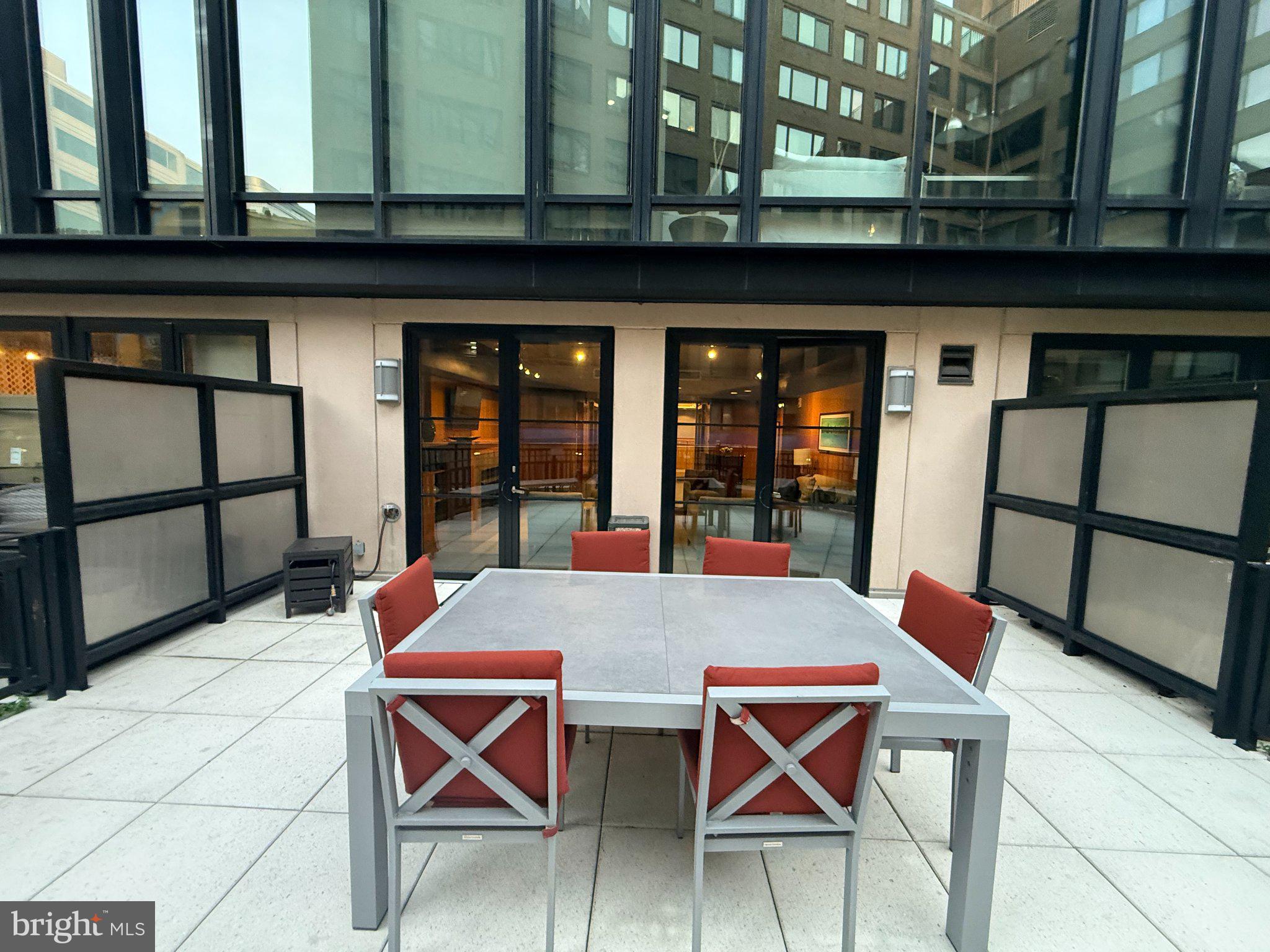 1133 14th Street Northwest, Unit 503 Washington, DC 20005 - Photo 20 of 29 Stylish outdoor dining oasis.