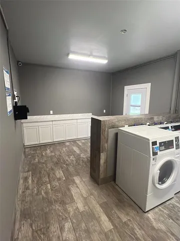 a utility room with washer and dryer