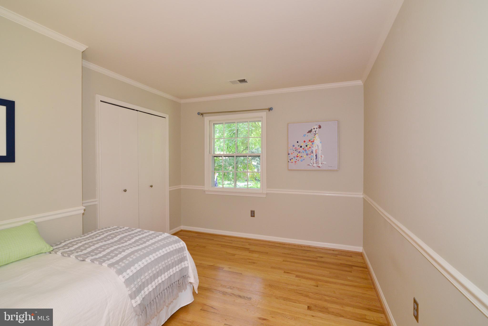 11480 Bingham Terrace Reston, VA 20191 - Photo 36 of 48 Bedroom #4 with mouldings and hardwoods.