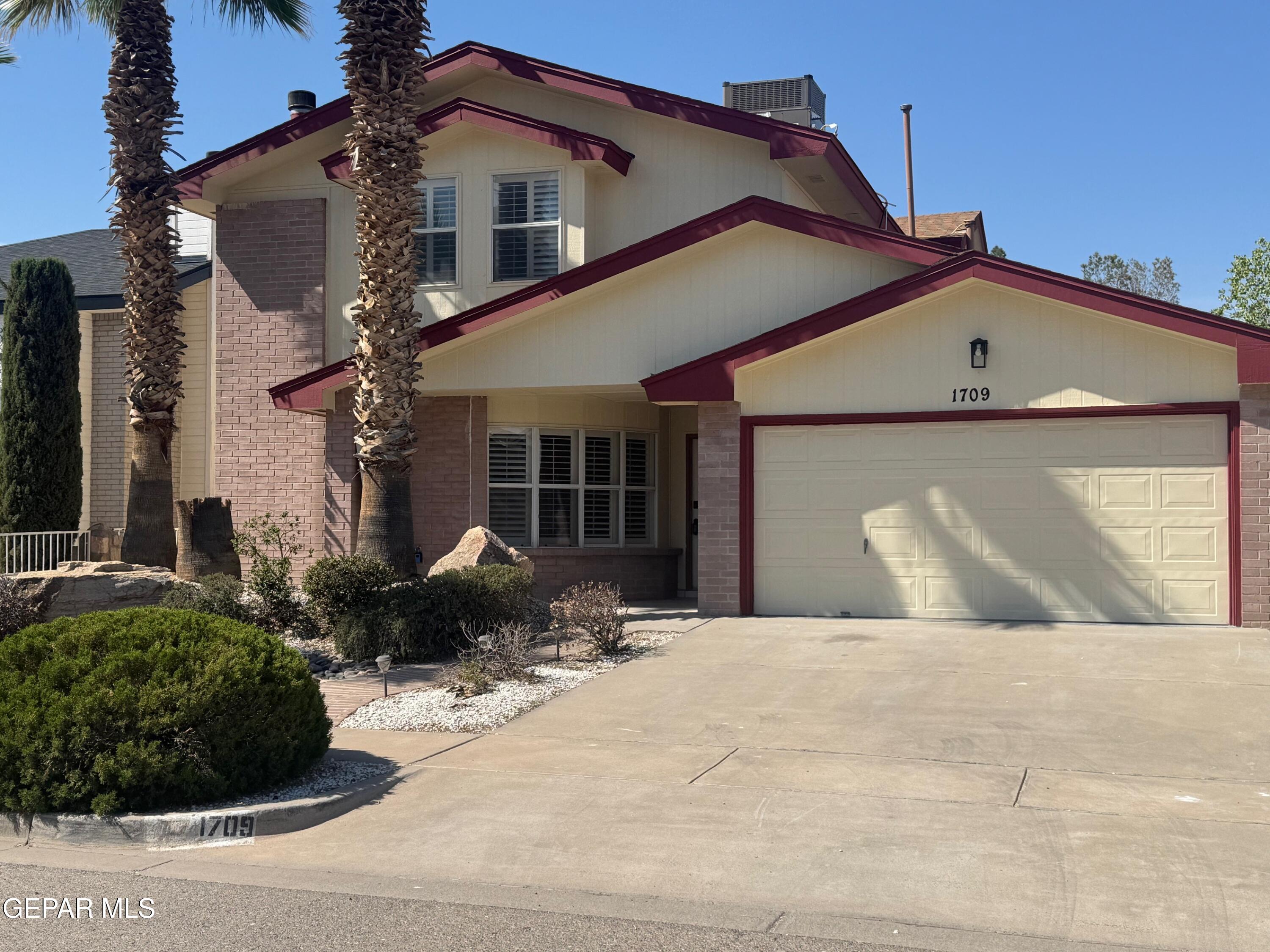 1709 Mitchell Jones Drive El Paso, TX 79936 - Photo 1 of 1 a front view of a house with a yard