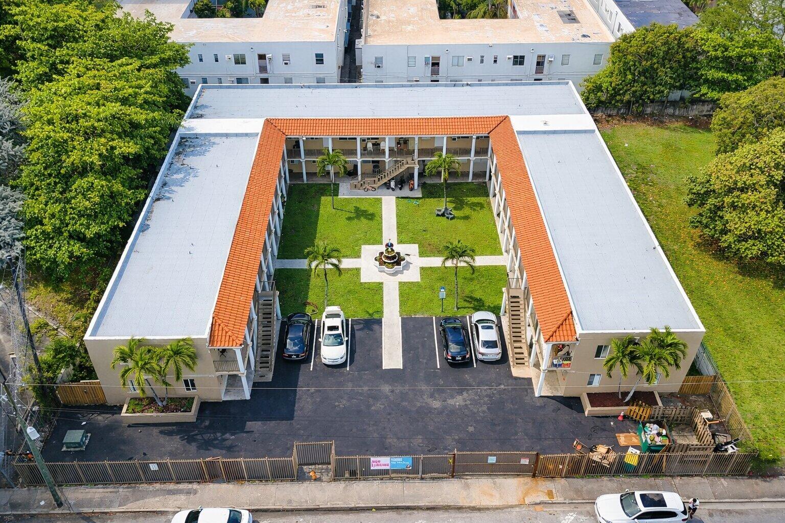 420 Northwest 10th Street, Unit 9 Miami, FL 33136 - Photo 11 of 14 aerial view of a house with sitting area