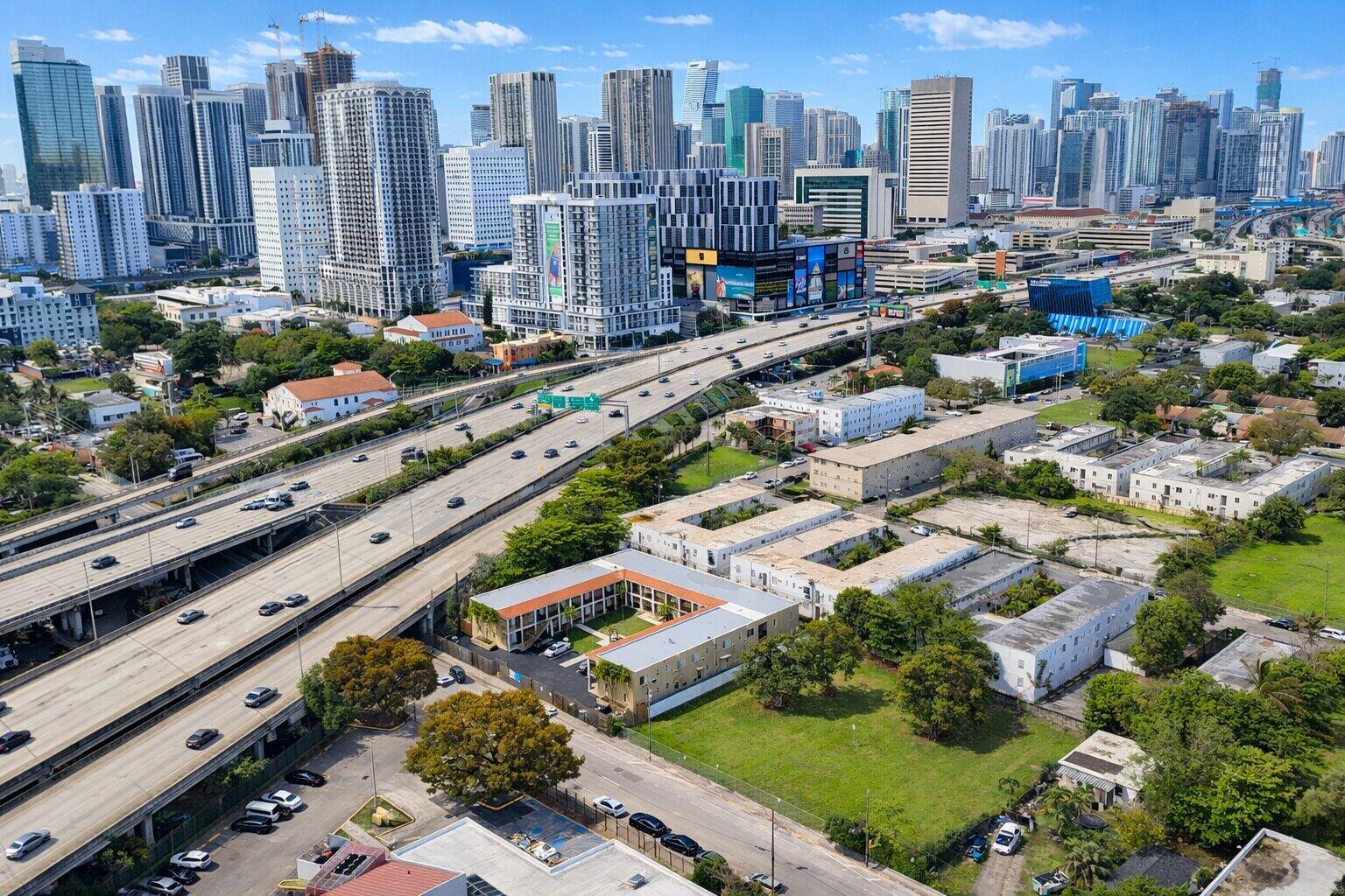 420 Northwest 10th Street, Unit 9 Miami, FL 33136 - Photo 14 of 14 a city view with tall buildings