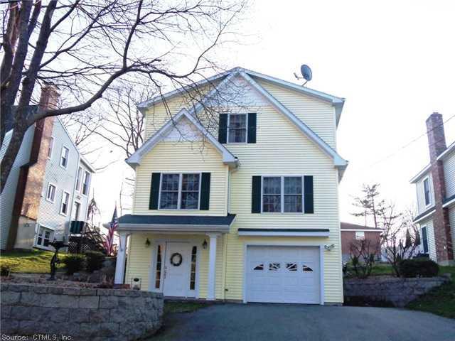 8 South Edgewood Road East Lyme, CT 06357 - Photo 1 of 1 a front view of a house with a yard