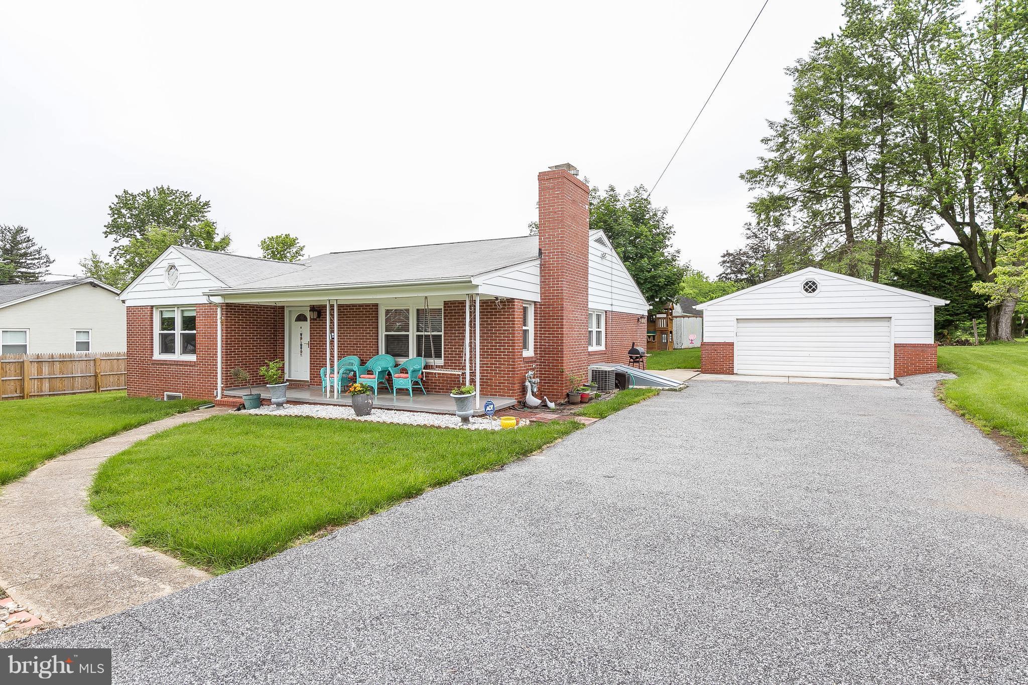10 Harding Street Lutherville-Timonium, MD 21093 - Photo 2 of 30 a front view of a house with yard porch and green space