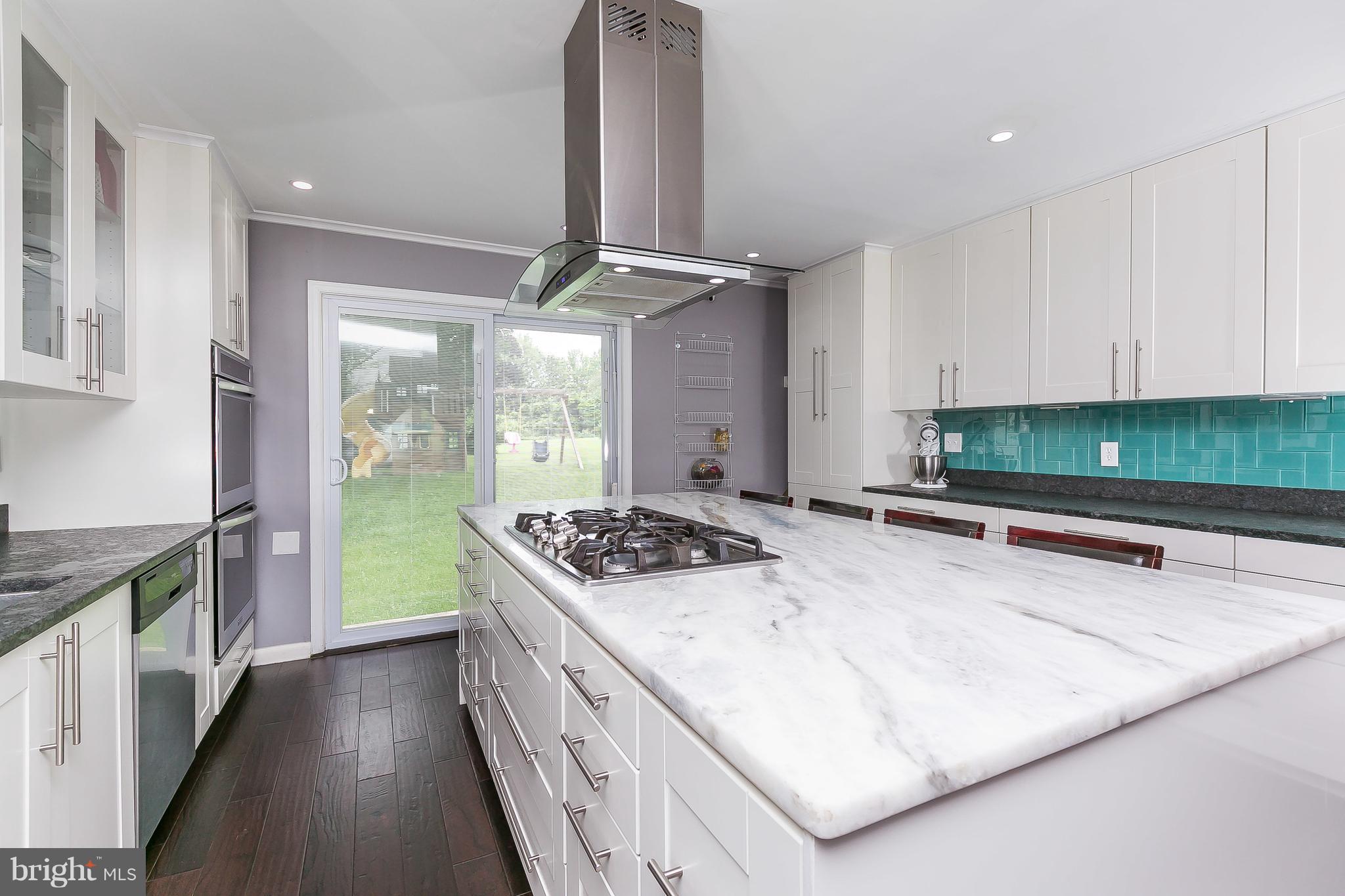 10 Harding Street Lutherville-Timonium, MD 21093 - Photo 16 of 30 a kitchen with stainless steel appliances granite countertop a stove and a sink