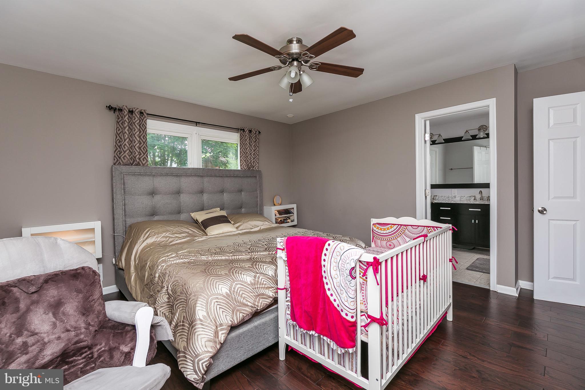 10 Harding Street Lutherville-Timonium, MD 21093 - Photo 21 of 30 a bedroom with a bed and window
