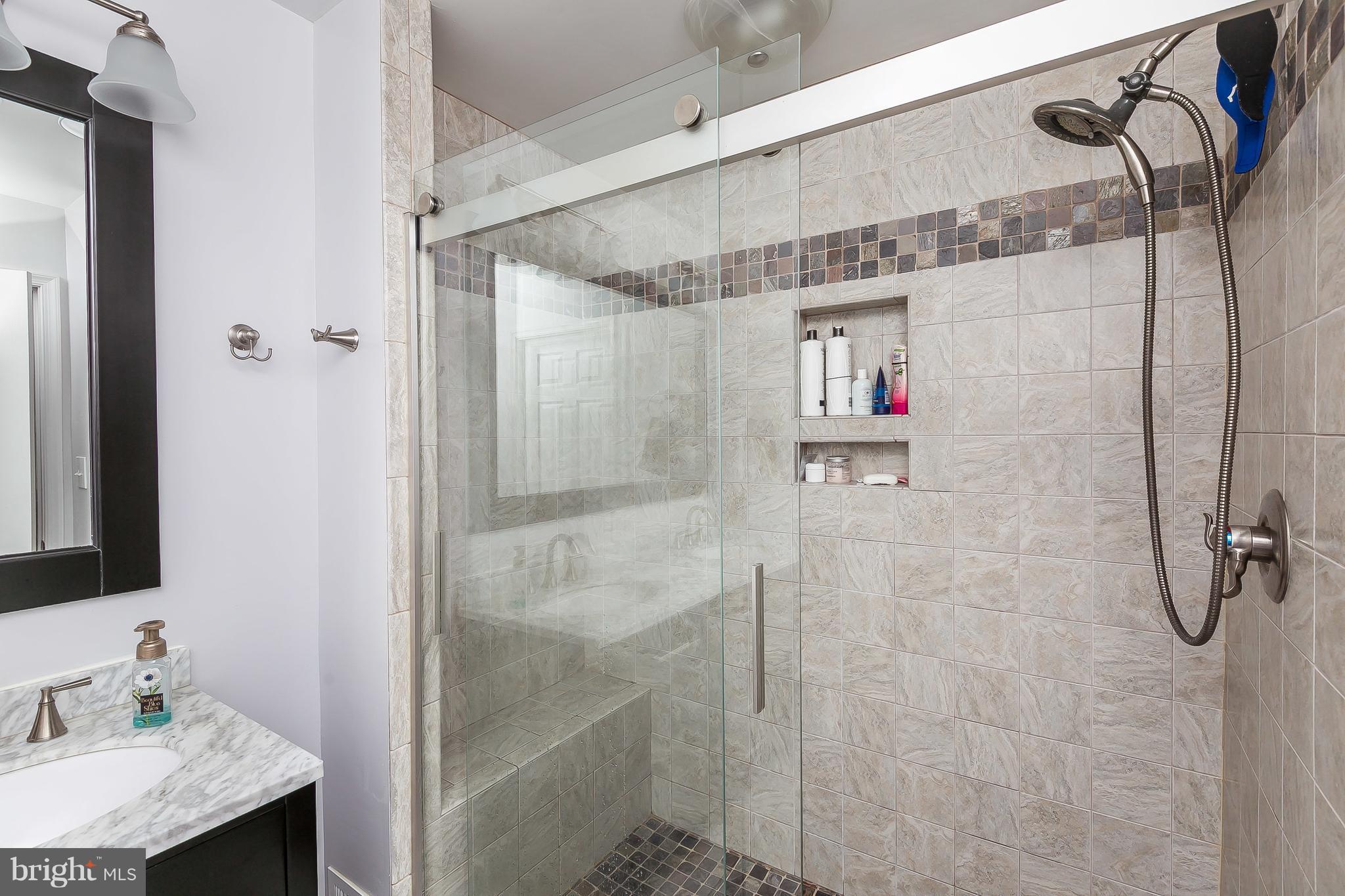10 Harding Street Lutherville-Timonium, MD 21093 - Photo 24 of 30 a bathroom with a shower