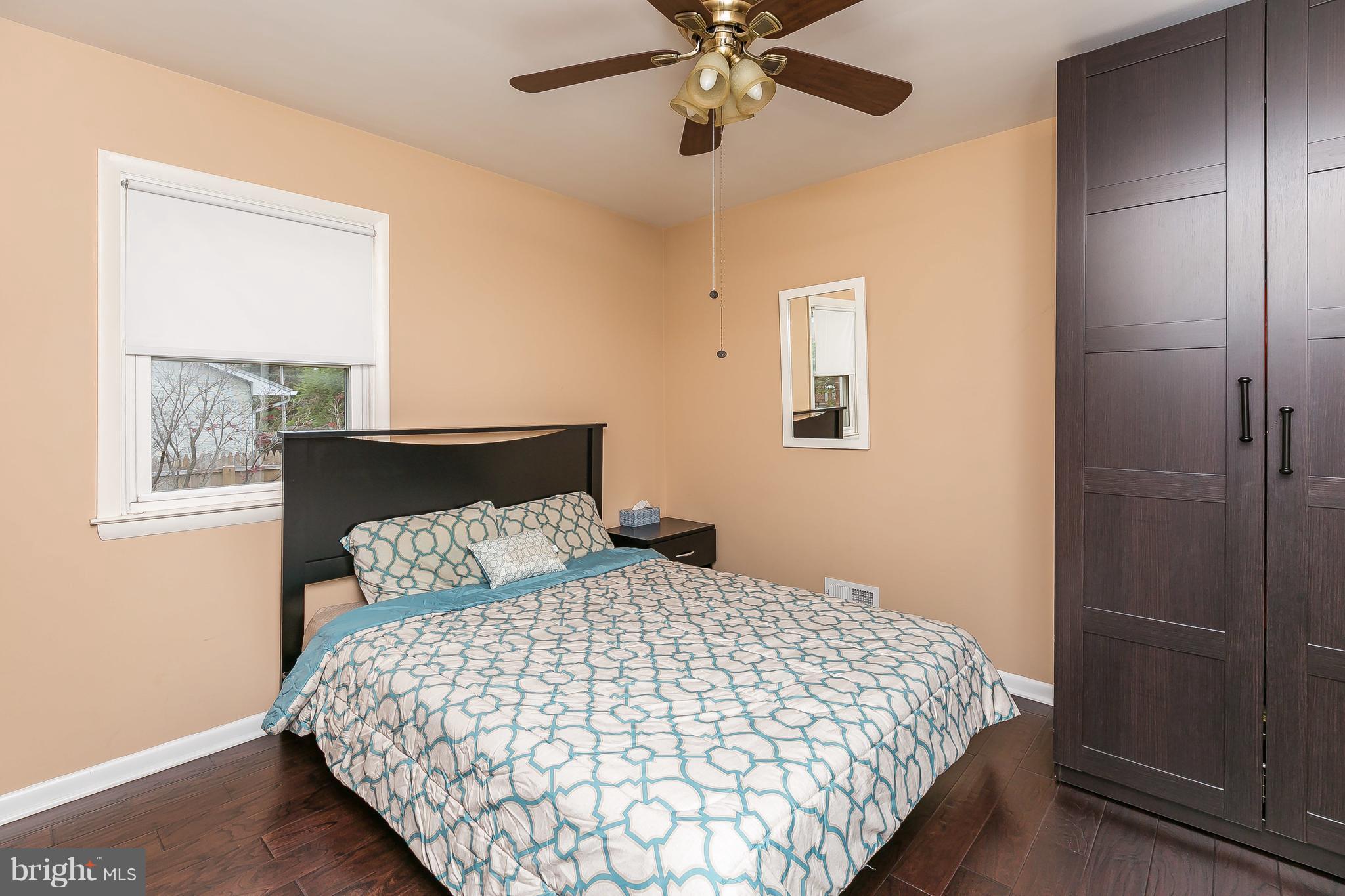 10 Harding Street Lutherville-Timonium, MD 21093 - Photo 28 of 30 a bedroom with a bed and window