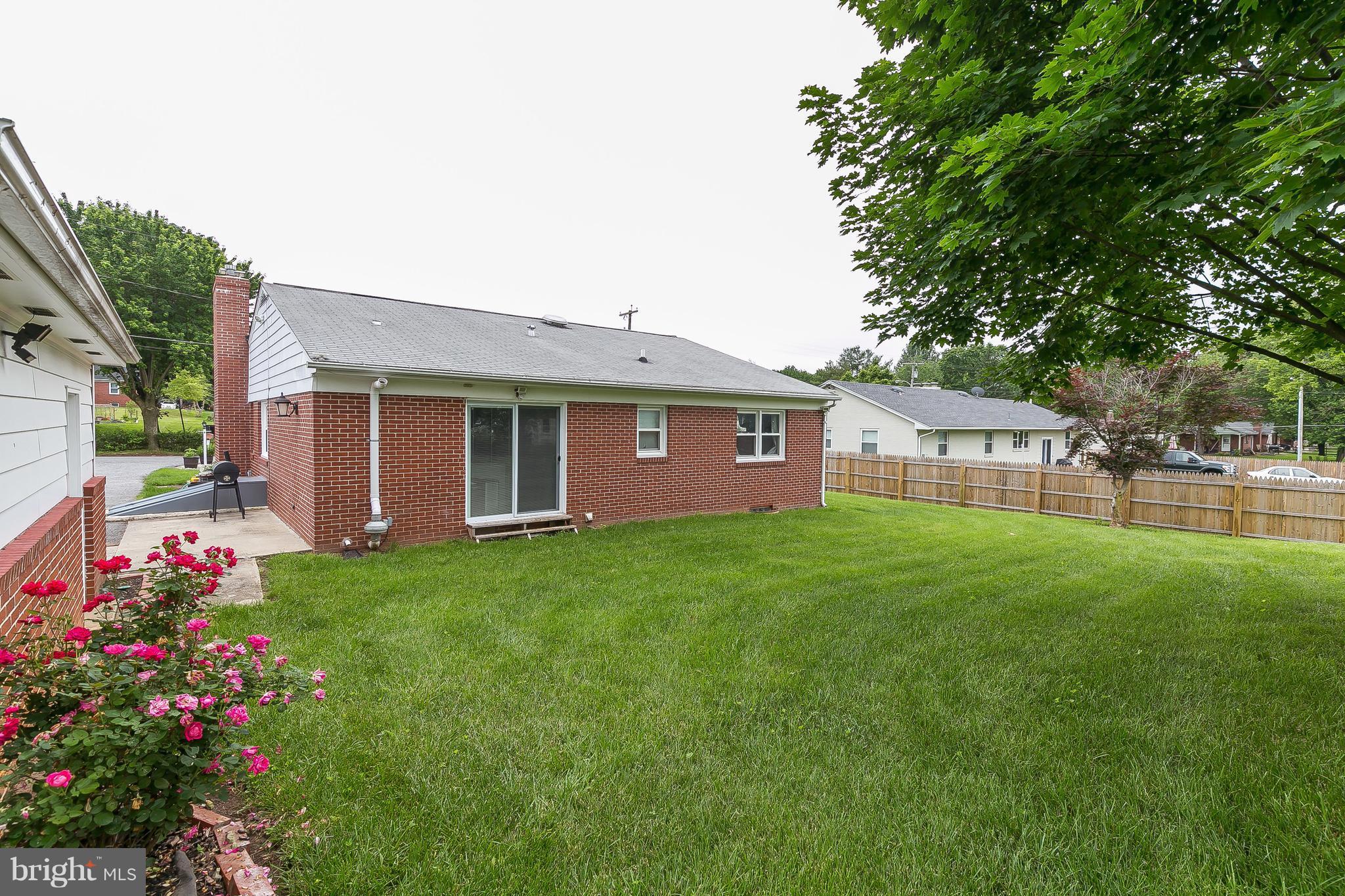 10 Harding Street Lutherville-Timonium, MD 21093 - Photo 6 of 30 a view of a house with a big yard and potted plants