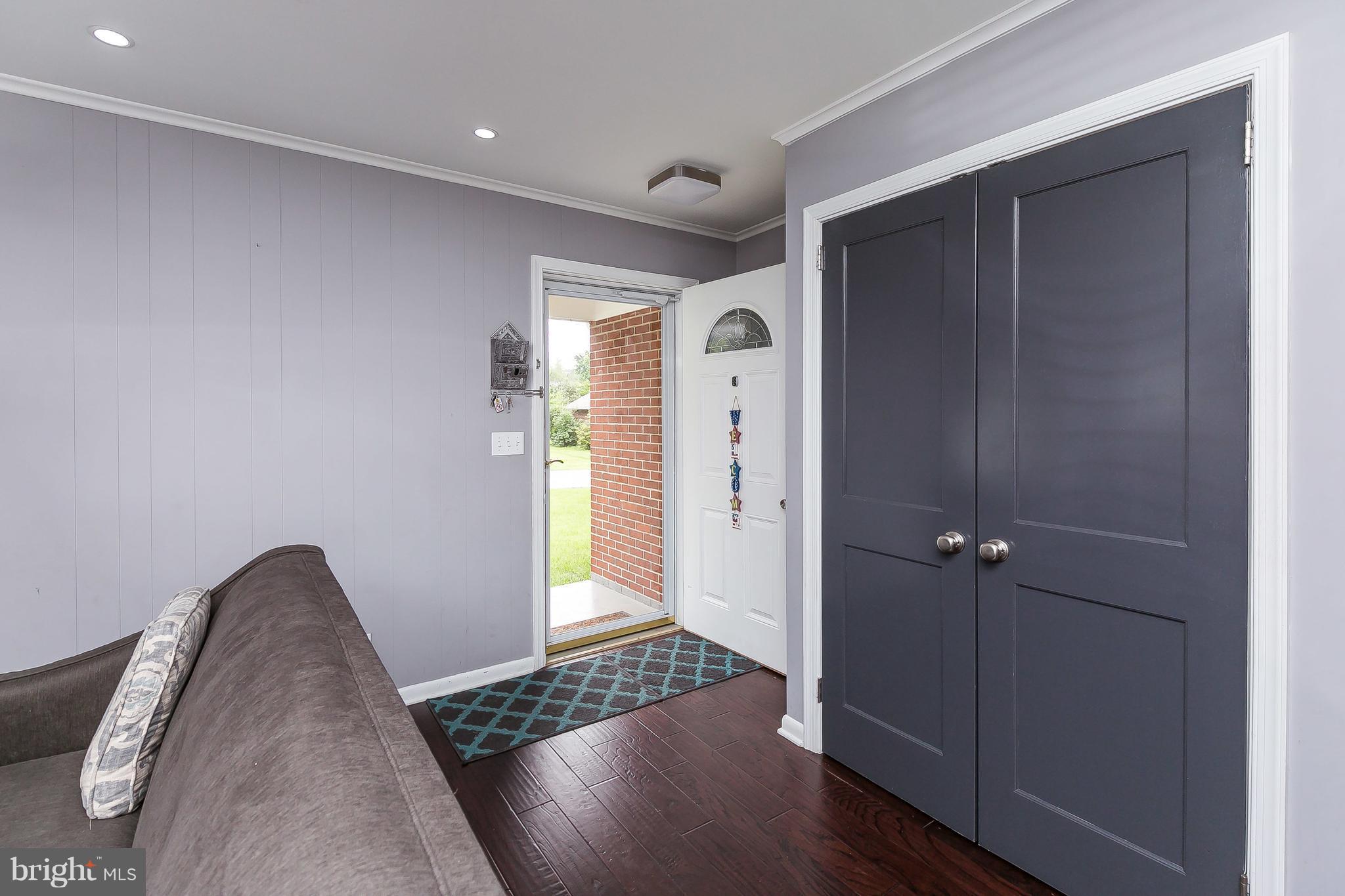 10 Harding Street Lutherville-Timonium, MD 21093 - Photo 7 of 30 a view of room with walk in closet and wooden floor