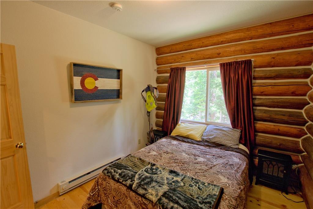 101 Rachaels Place Fairplay, CO 80440 - Photo 11 of 25 a bedroom with a bed and a window