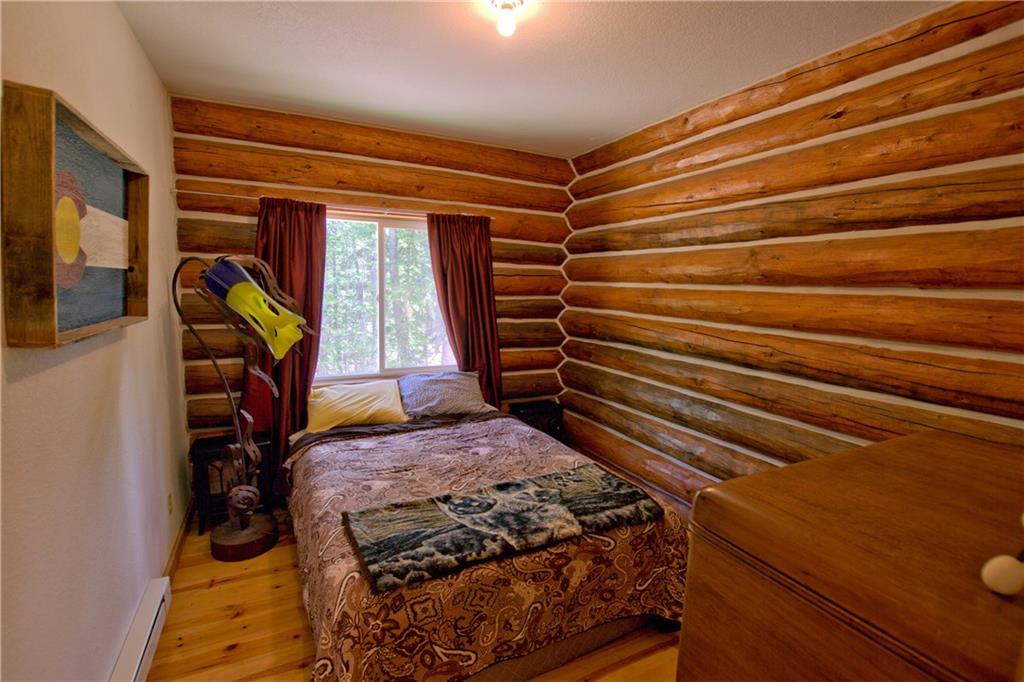 101 Rachaels Place Fairplay, CO 80440 - Photo 5 of 25 a bedroom with a bed and a window