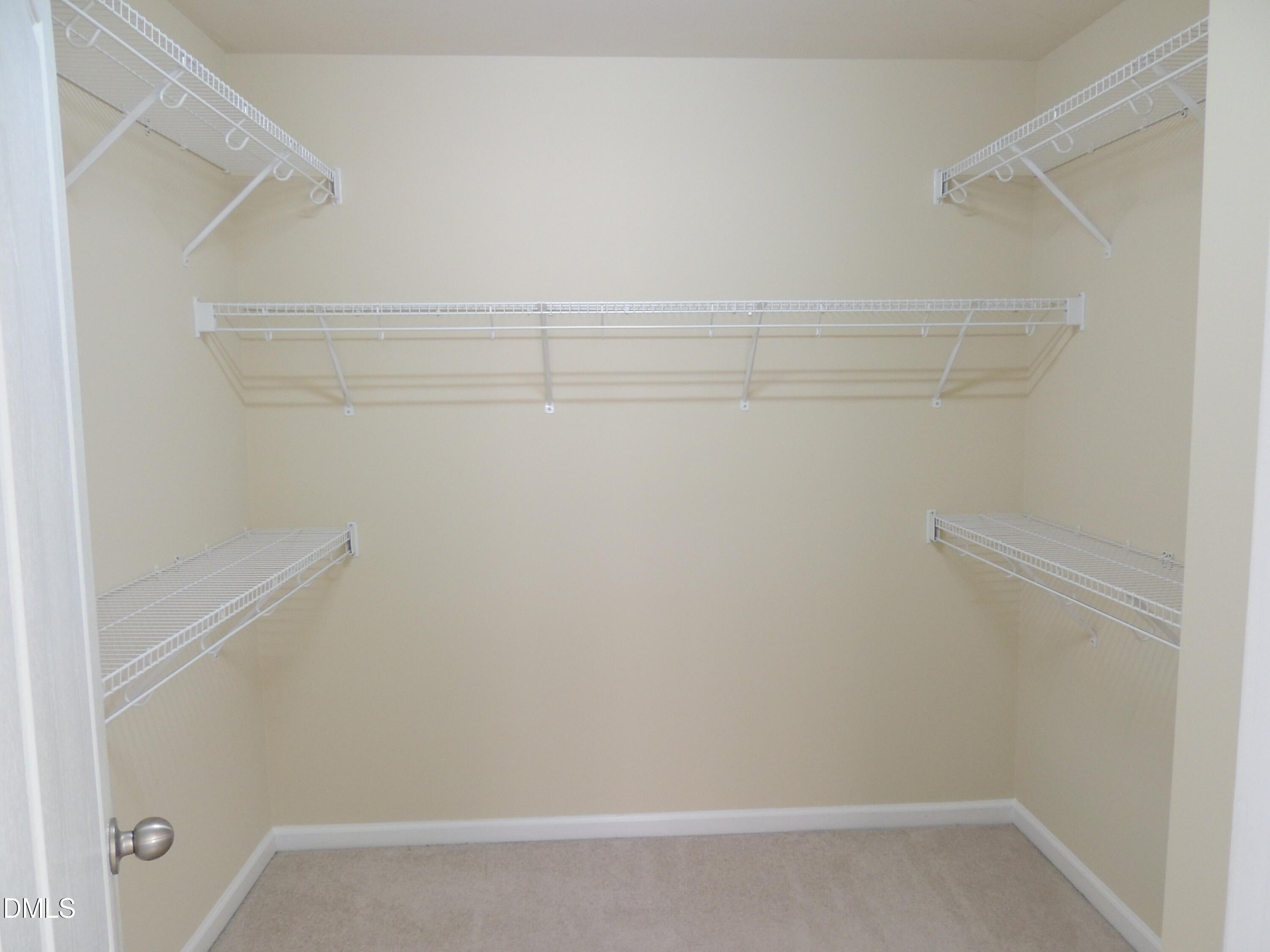 12544 Honeychurch Street Raleigh, NC 27614 - Photo 14 of 24 a view of a closet