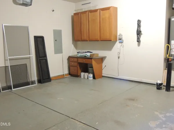 a view of an empty room with closet
