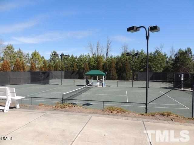 12544 Honeychurch Street Raleigh, NC 27614 - Photo 24 of 24 a view of a tennis court