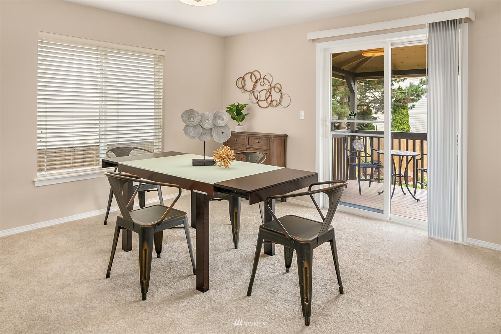 4019 152nd Place Southeast Bothell, WA 98012 - Photo 9 of 20 a view of a dining room and livingroom with furniture