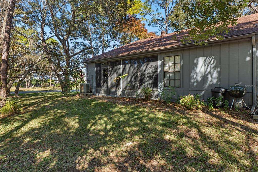 2129 Point O Woods Court Spring Hill, FL 34606 - Photo 26 of 76 a view of outdoor space yard and patio