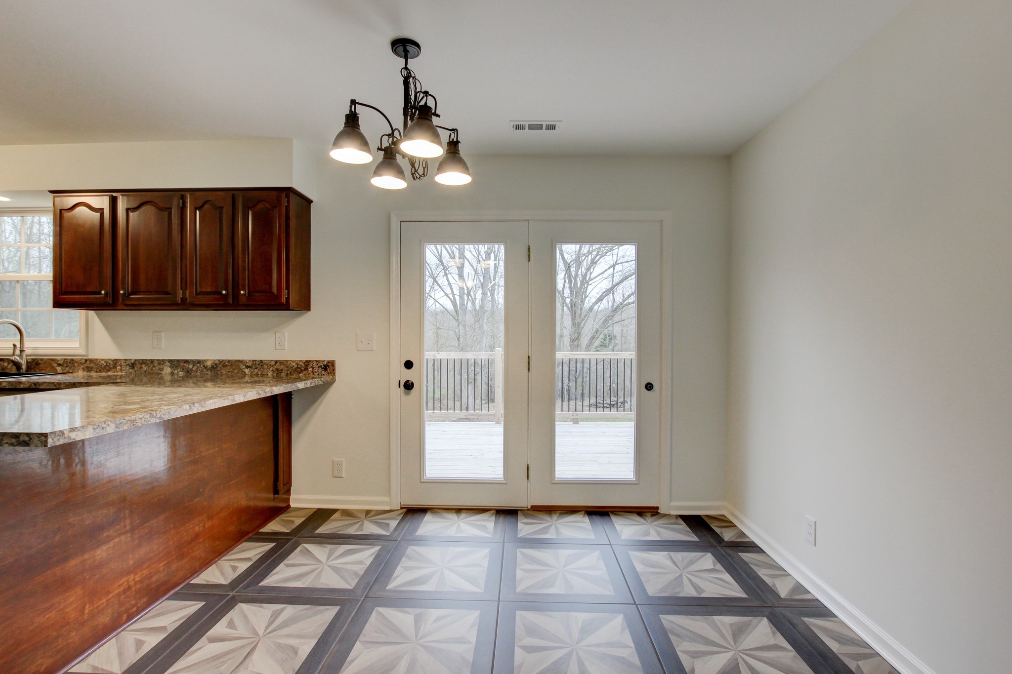 825 Pollard Road Clarksville, TN 37042 - Photo 24 of 44 a view of an empty room with window and wooden floor