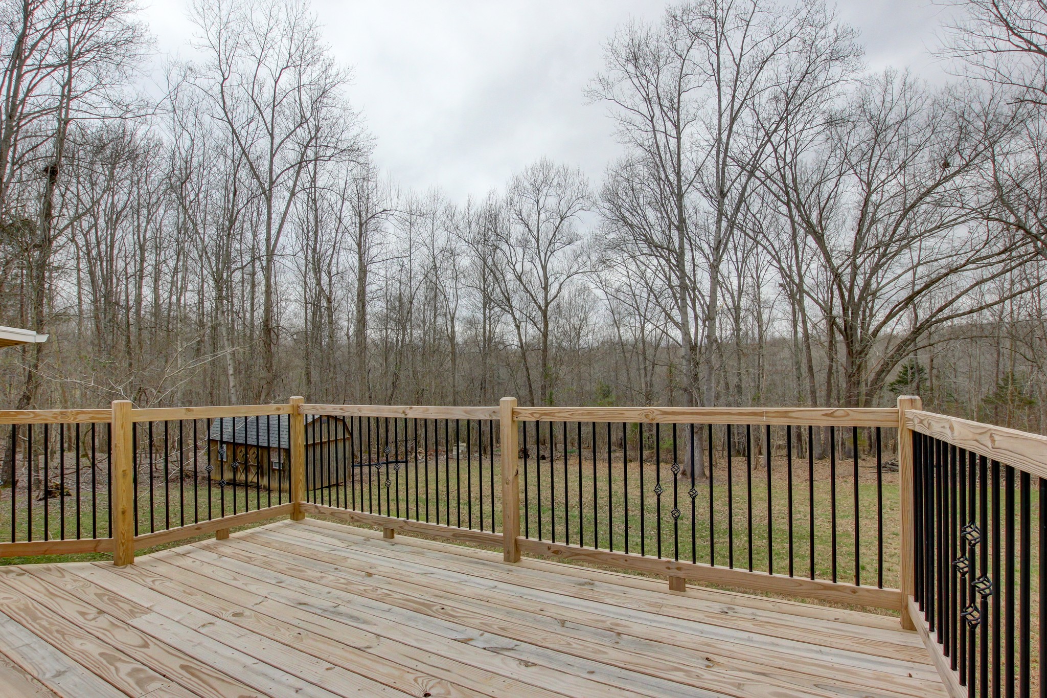 825 Pollard Road Clarksville, TN 37042 - Photo 27 of 44 a view of wooden deck and trees