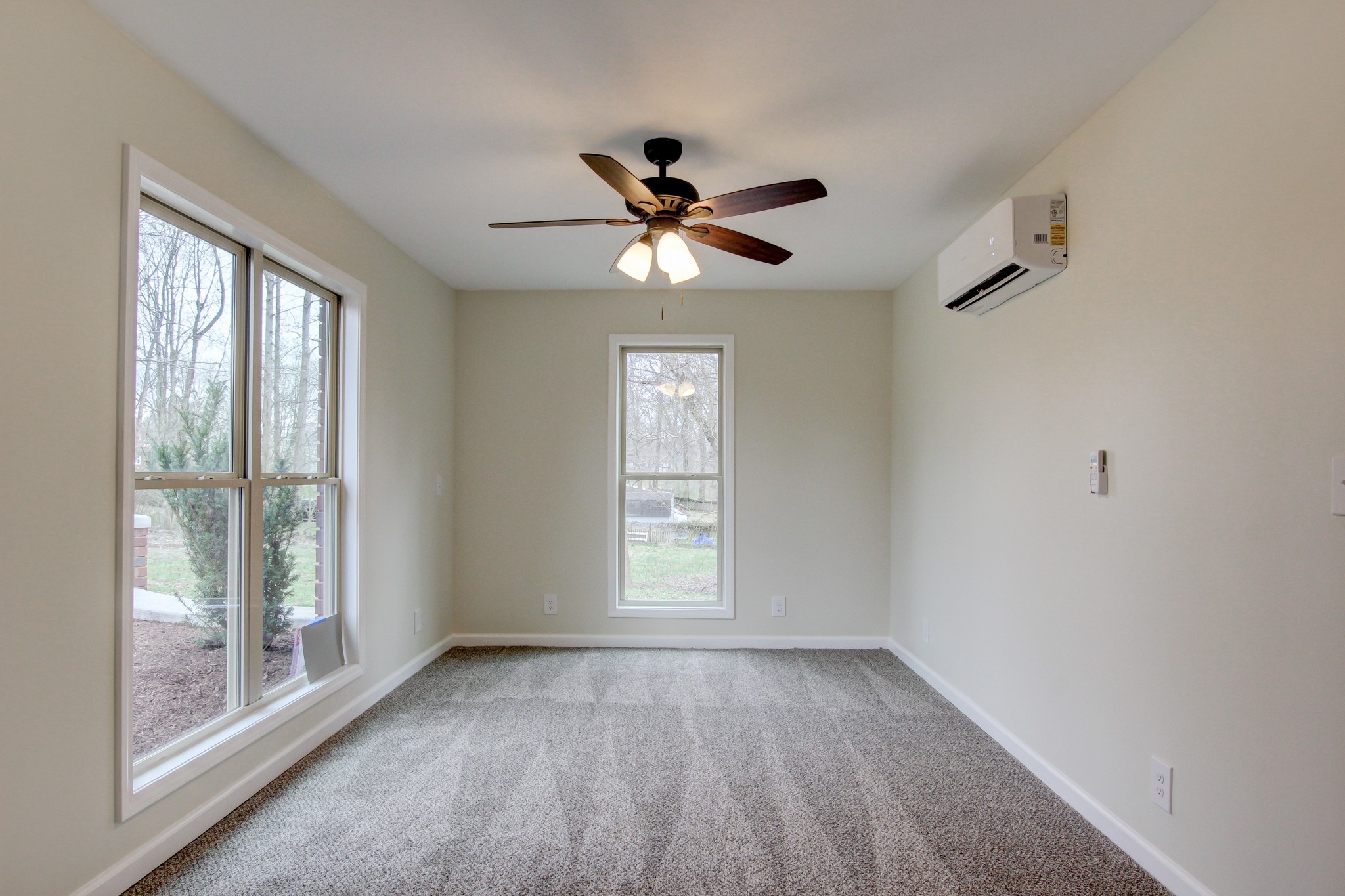 825 Pollard Road Clarksville, TN 37042 - Photo 9 of 44 wooden floor in an empty room with a window